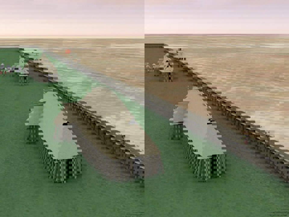 Sådan forestiller man sig palisaden og kasernebygninger har set ud.  Sådan forestiller man sig palisaden og kasernebygninger har  set ud. (Illustration: Peter Jensen, Aarhus Universitet)