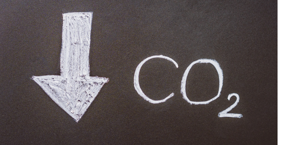 Illustration: En pil peger nedad ved siden af teksten CO2